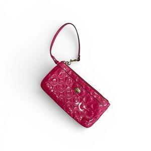 Pink Embossed Leather Wristlet